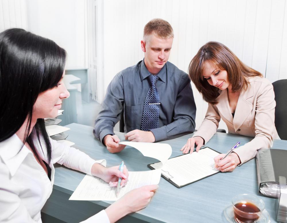 A mortgage originator leads a buyer through the mortgage process.