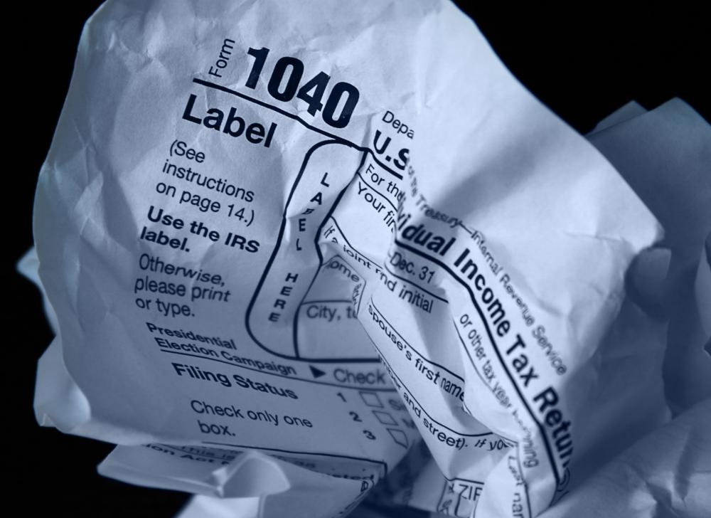 A tax evader intentially chooses not to file and pay income taxes that are due.