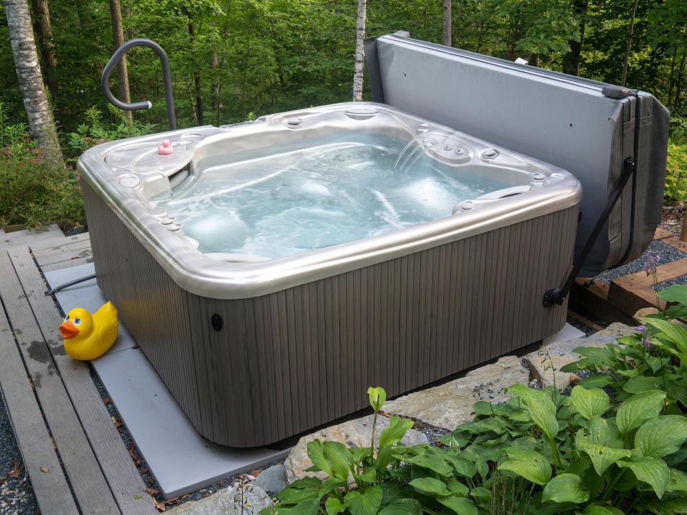 Hospitality management may oversee the inclusion of amenities, such as hot tubs.