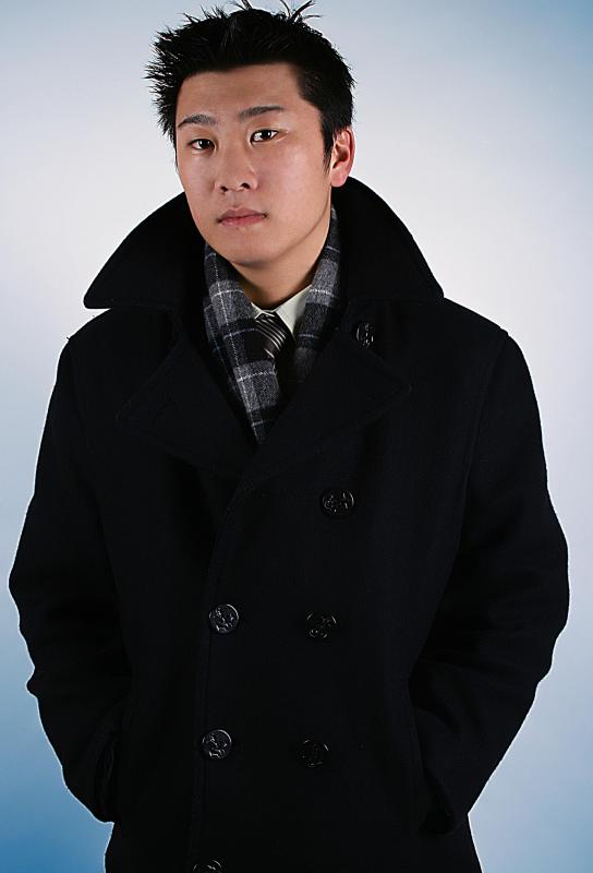 Double-breasted refers to a jacket or coat with two vertical rows of buttons down its front.