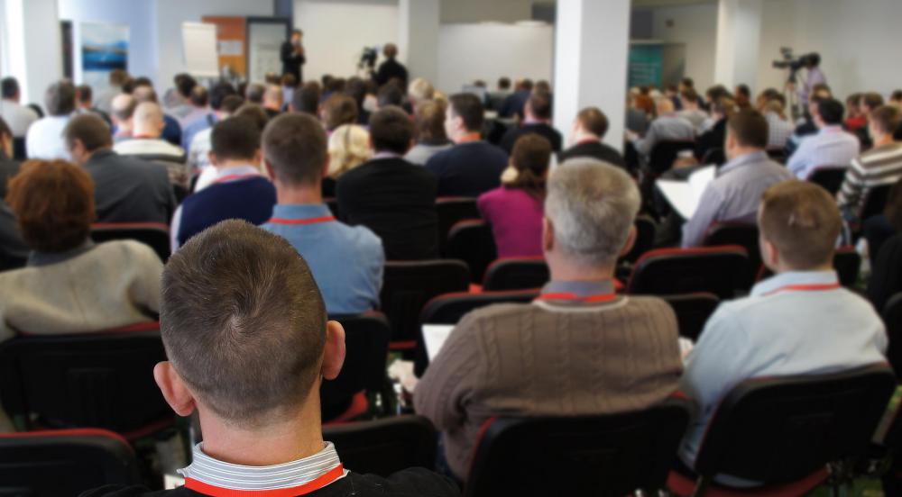 Travel vouchers can cover an employee's cost when they attend a conference.