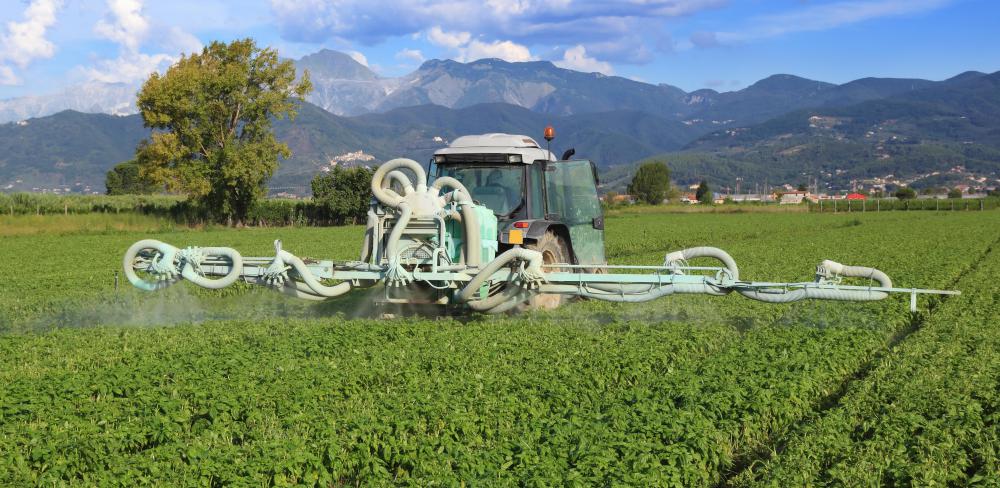 Harmful chemicals, such as pesticides and herbicides, are sprayed on agribusiness crops to control bug and weed infestations.