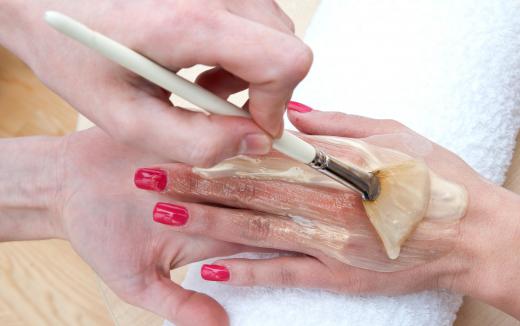 Skin softening treatments may be applied during a manicure.