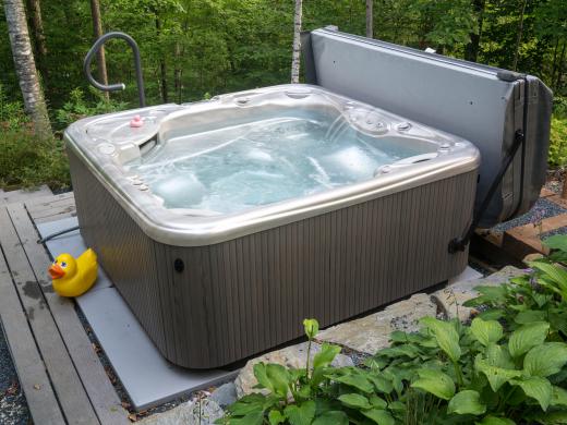 Hospitality management may oversee the inclusion of amenities, such as hot tubs.