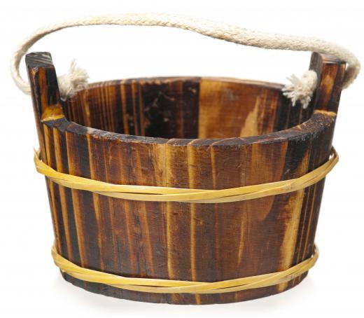 Flood irrigation used to be accomplished by individuals transporting buckets of water to a field.
