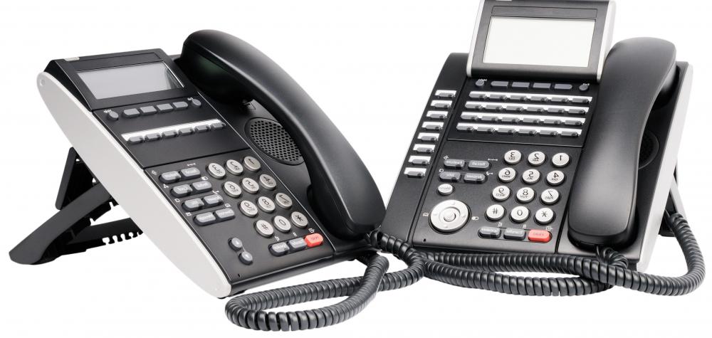 Teleconferences may be conducted using telephones.