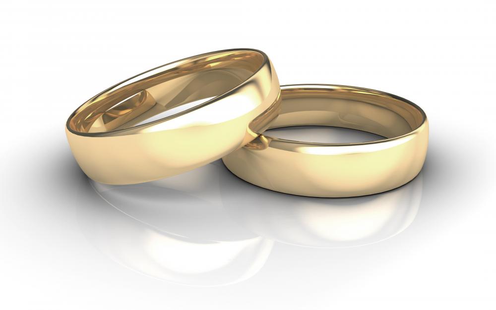 A personal property appraiser determines the value of jewelry, like gold rings.