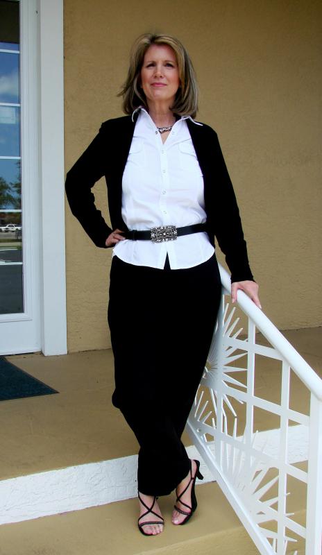 Woman in business casual dress.
