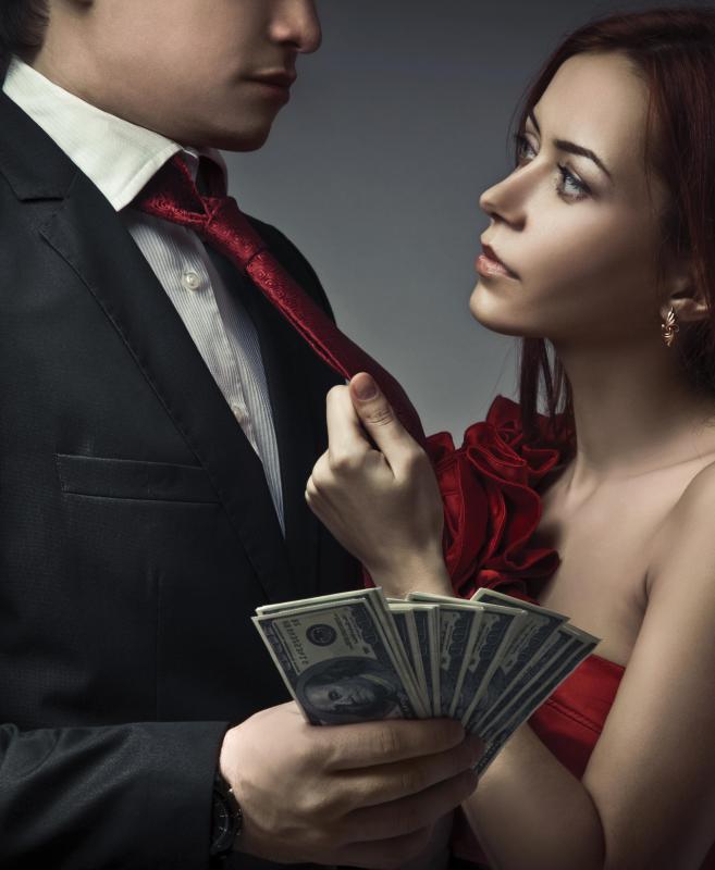 Bribing someone to get information about a company is a type of industrial espionage.