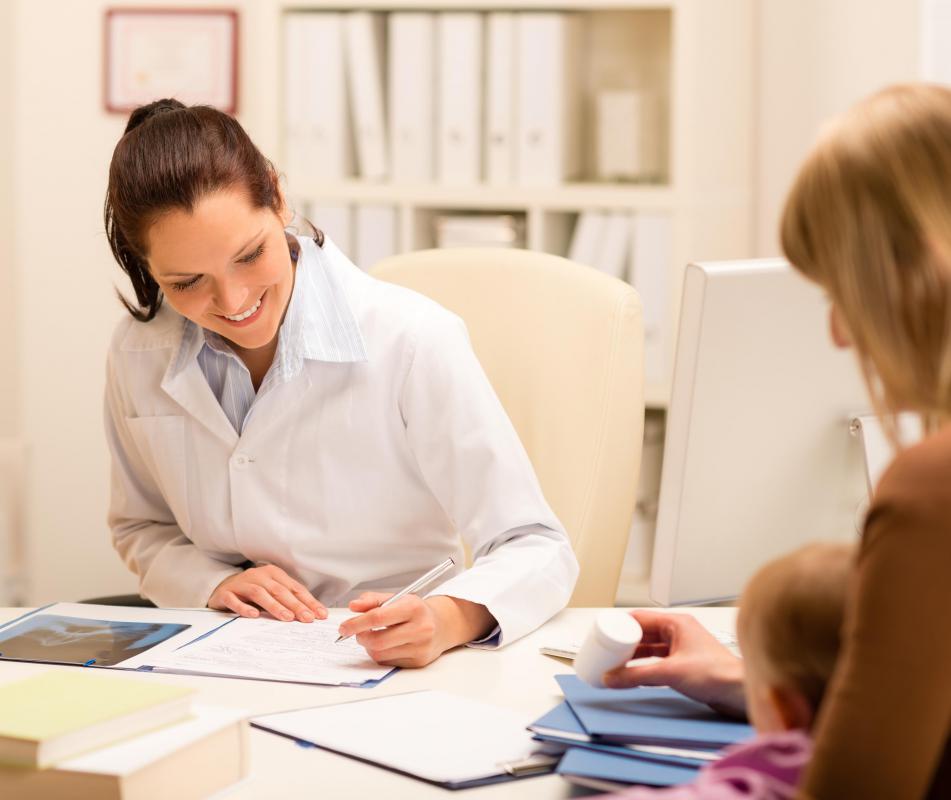 A health underwriter examines and writes documents for patients in health care.