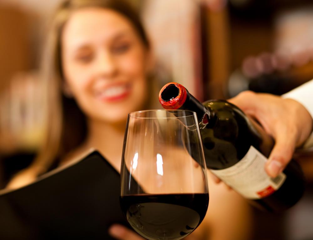 A server may use cross-selling to sell a glass of wine to a customer who only intended to purchase dinner.