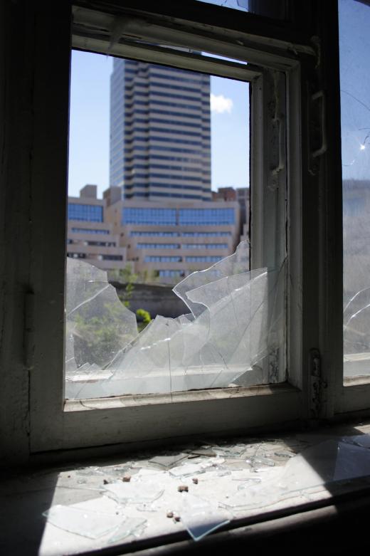 Windows broken by vandalism is a type of property damage.