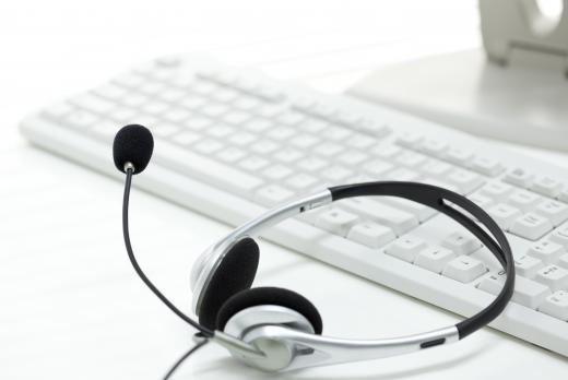 Employees at offshore call centers usually use a hands free headset to communicate with clients.