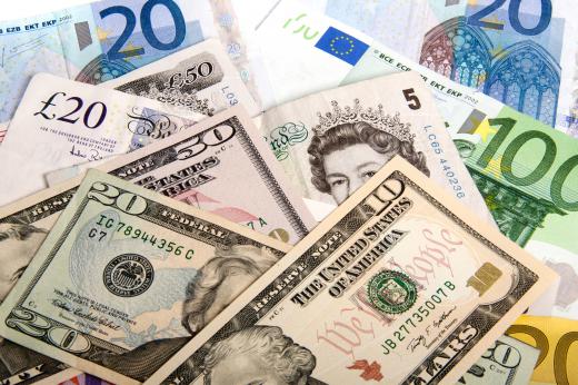 Various types of currency, including US dollars, pounds sterling, and euros.