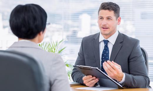 Human resources staff interviews and evaluates potential new staff members.