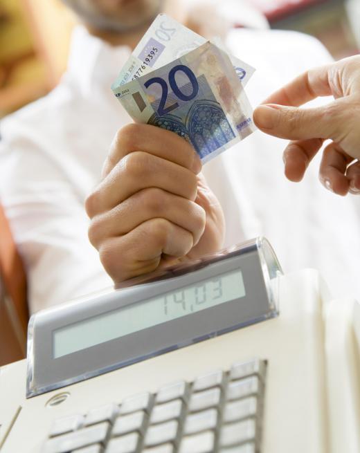 A cashier taking a payment.