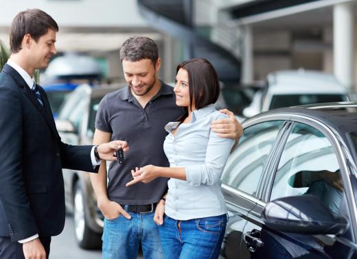 Some dealerships ask customers to complete surveys about their decision making process after they buy a new car.